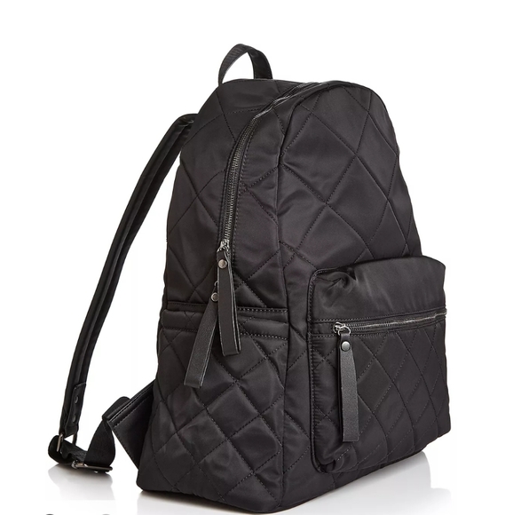 Sol & Selene Handbags - Sol & Selene large motivated quilted backpack